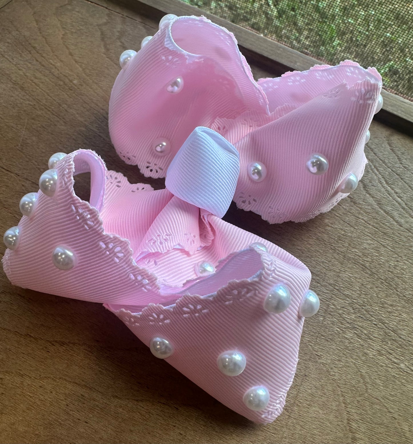 Pink lace-trimmed bow with hand-placed pearls, called Pearl Princess, boutique handmade hair bow