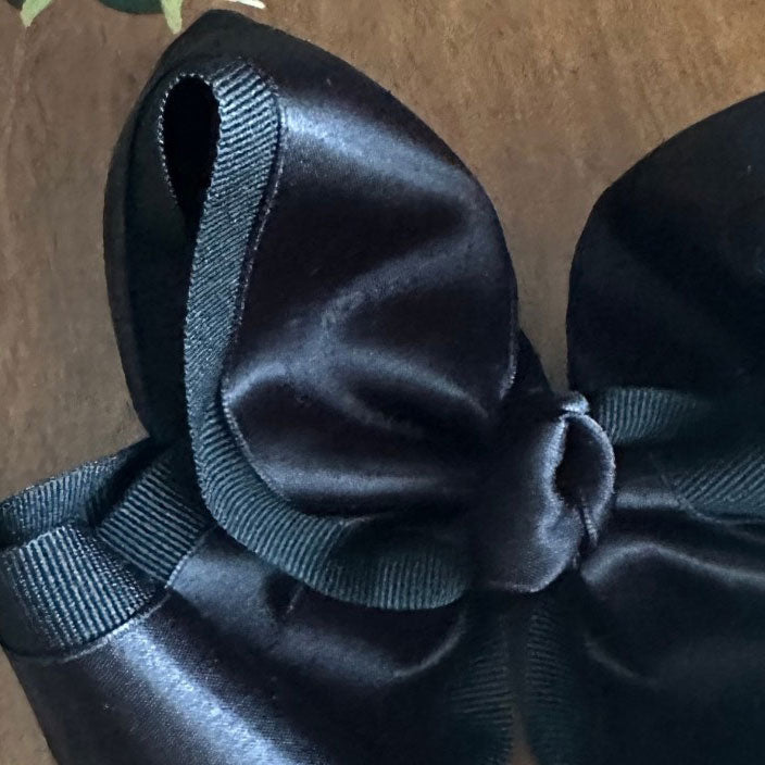 Handmade black grosgrain satin bow | classic boutique hair accessory for girls by The Britt Bow Co.