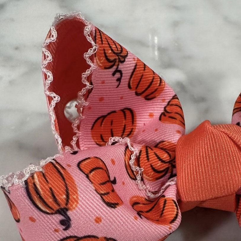 Handmade blush pink pumpkin hair bow | boutique fall accessory for girls by The Britt Bow Co