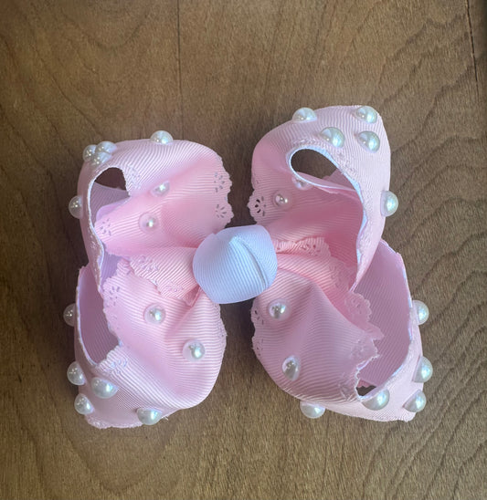 Pink lace-trimmed bow with hand-placed pearls, called Pearl Princess, boutique handmade hair bow