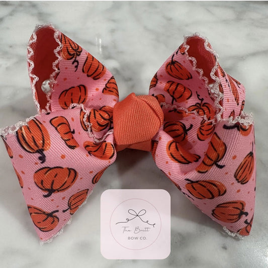 Handmade blush pink pumpkin hair bow | boutique fall accessory for girls by The Britt Bow Co