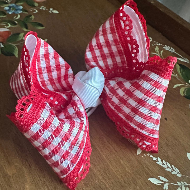 Handmade Parisian-inspired bow in soft red gingham | boutique hair accessory for girls by The Britt Bow Co.
