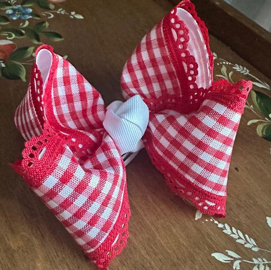 Handmade Parisian-inspired bow in soft red gingham | boutique hair accessory for girls by The Britt Bow Co.
