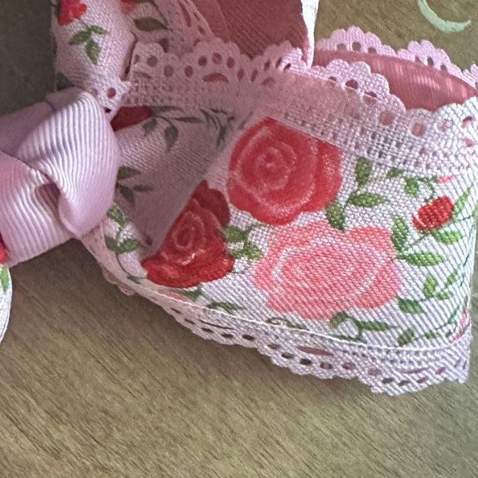 Handmade blush pink floral bow with vintage bouquet print | boutique girls’ hair accessory by The Britt Bow Co.